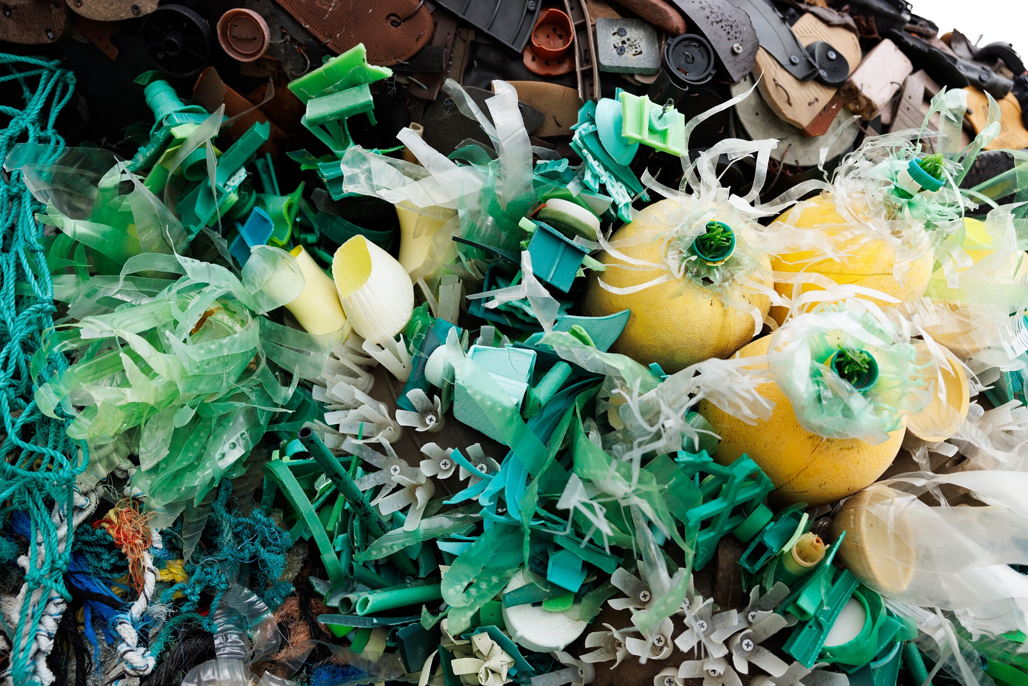 Each work of art is comprised of thousands of pieces of plastic that washed up on beaches.