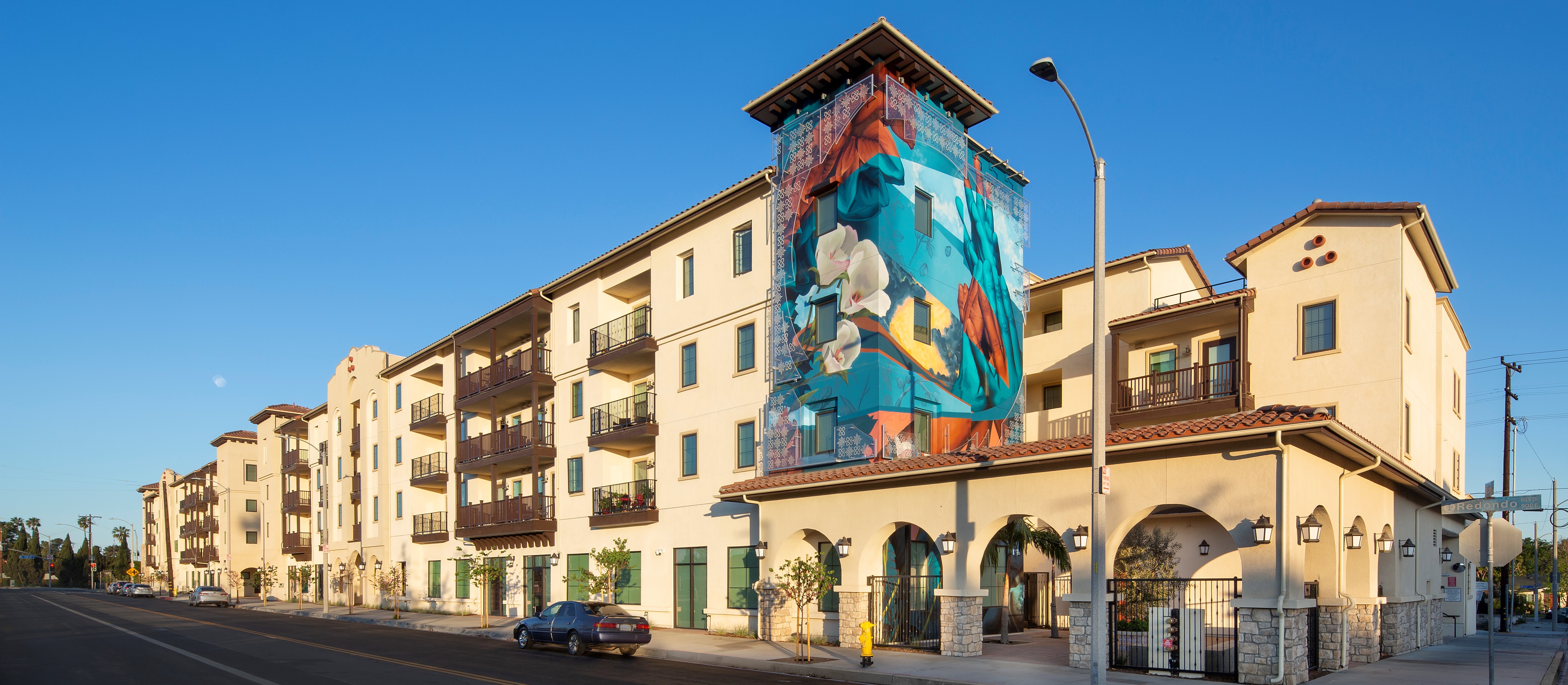 Fairview Heights apartments in Inglewood, featuring the "Rise Above" augmented reality mural.