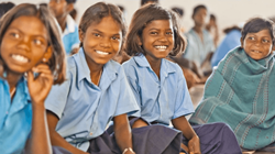 These smiling children are happy about their delicious meal at The Prem Rawat Foundation's Food for People facility in India.