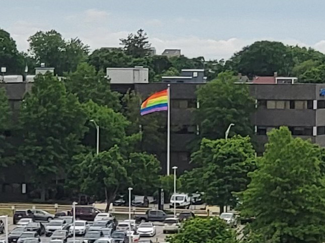 Granite flies the Pride flag at its headquarters in Quincy, Mass.