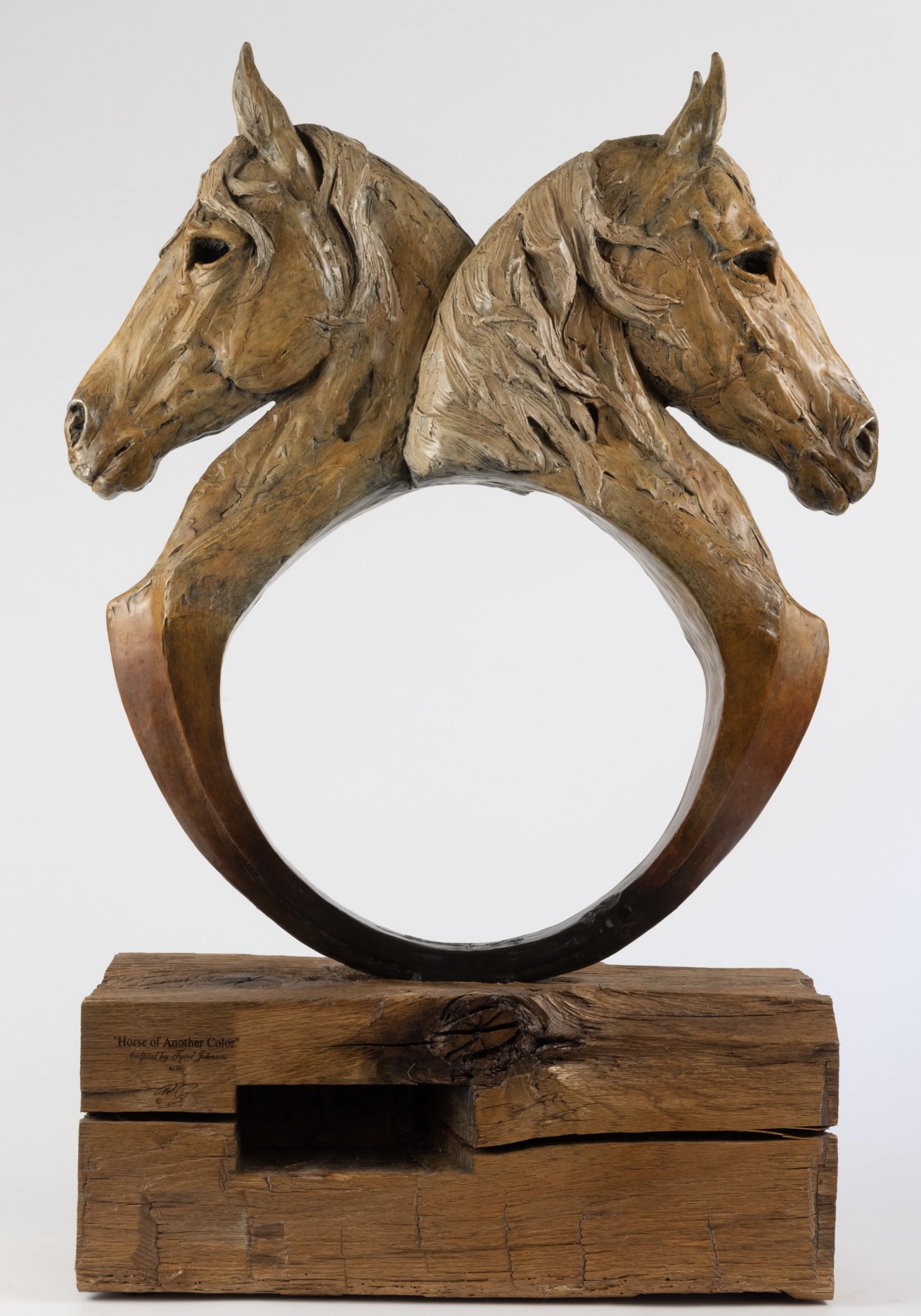 Rising-star Montana artist Tyrel Johnson joins the 2022 WDC Exhibit + Sale with his bronze-and-wood sculptures such as “Horse of Another Color.”