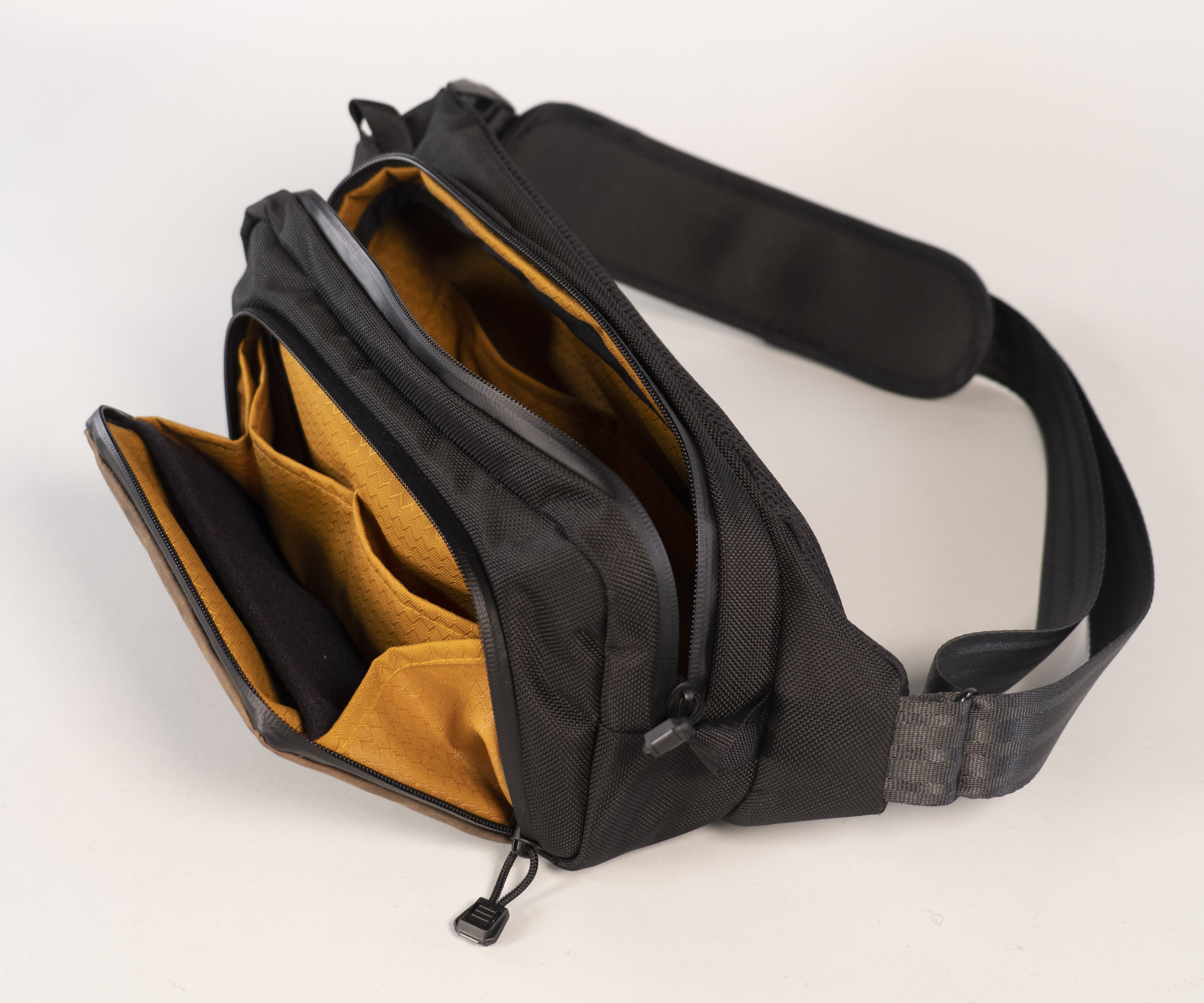 Dual compartments, each with interior organizational pockets