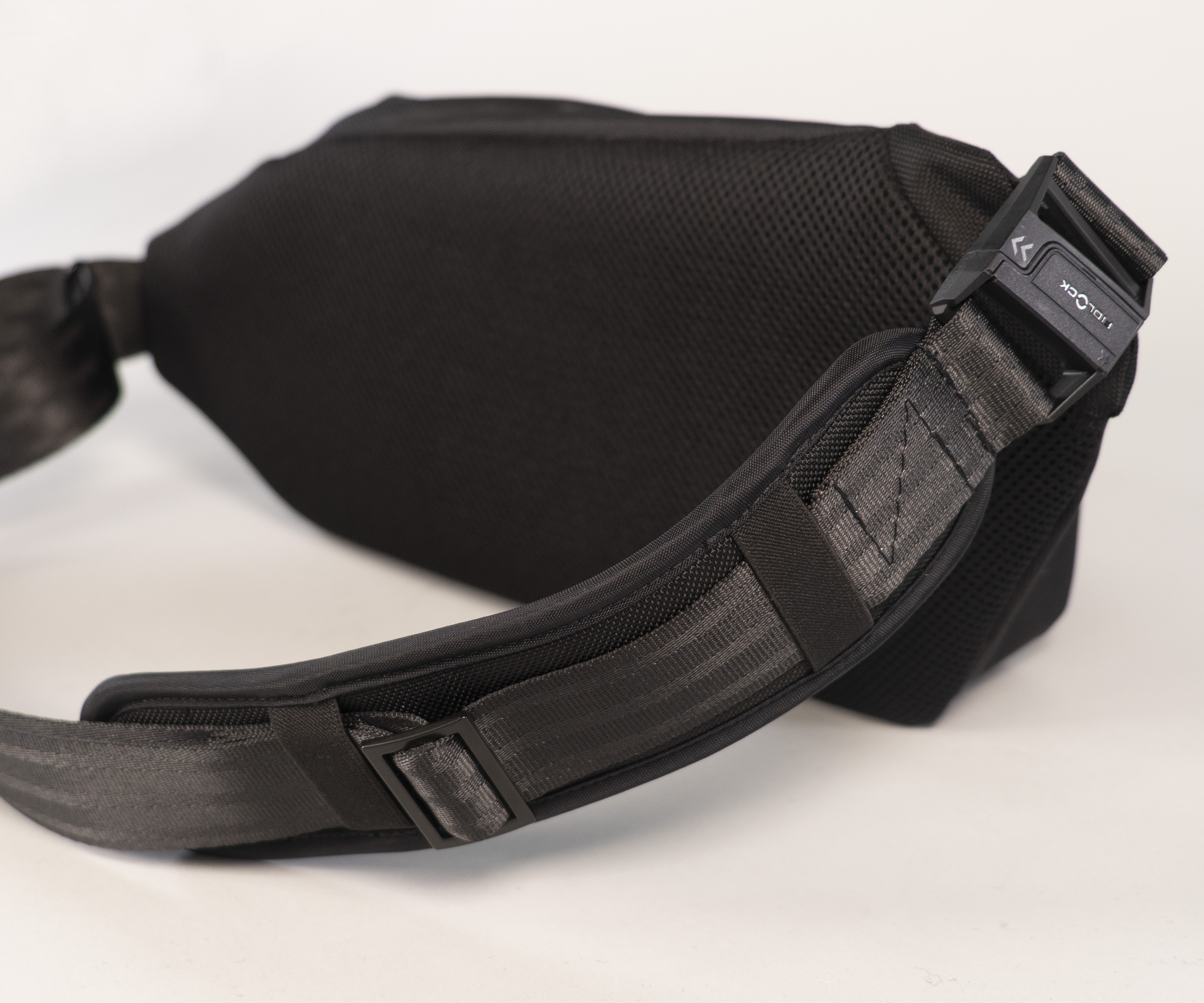 Magnetic Fidlock buckle; streamlined adjustable strap; moisture-wicking mesh backing