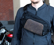 Moto Sling front-worn crossbody—innovative shape and strap system designed for motorcyclists and other active users