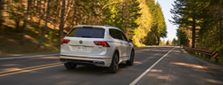 Rear and Side View of the 2022 VW Tiguan on the road