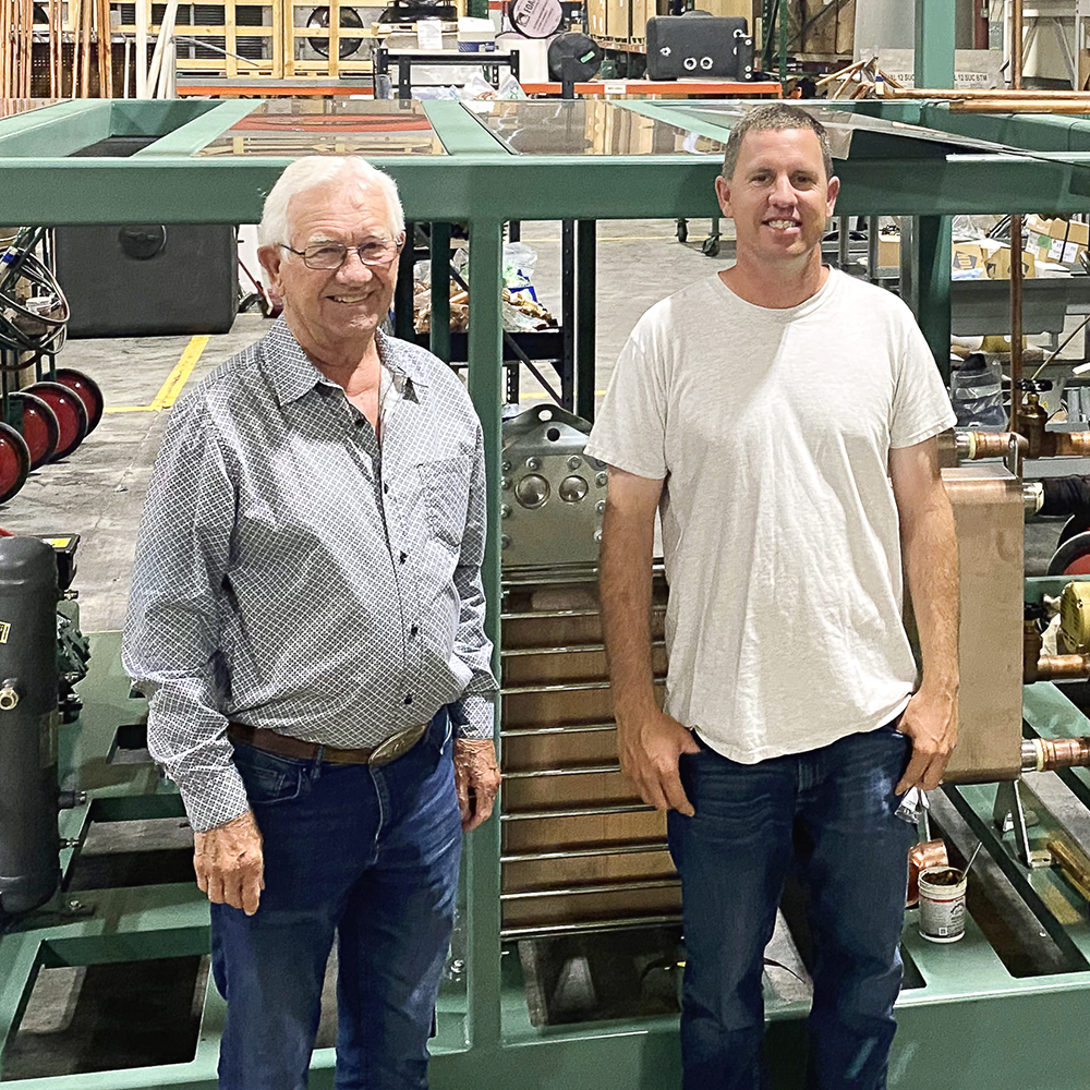 John Jongsma and his grandson Chris with the new 100 HP Chiller System