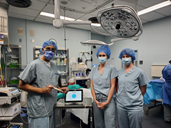 From left, Dr. Vipan Jain, MHA General Surgeon; Jacalyn Epp, MOLLI Surgical Clinical Application Specialist; Parker Sheehan, MOLLI Surgical Clinical Application Specialist.