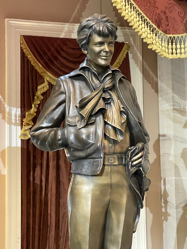 Statue features Earhart with one hand casually tucked in pocket of her favorite leather jacket.