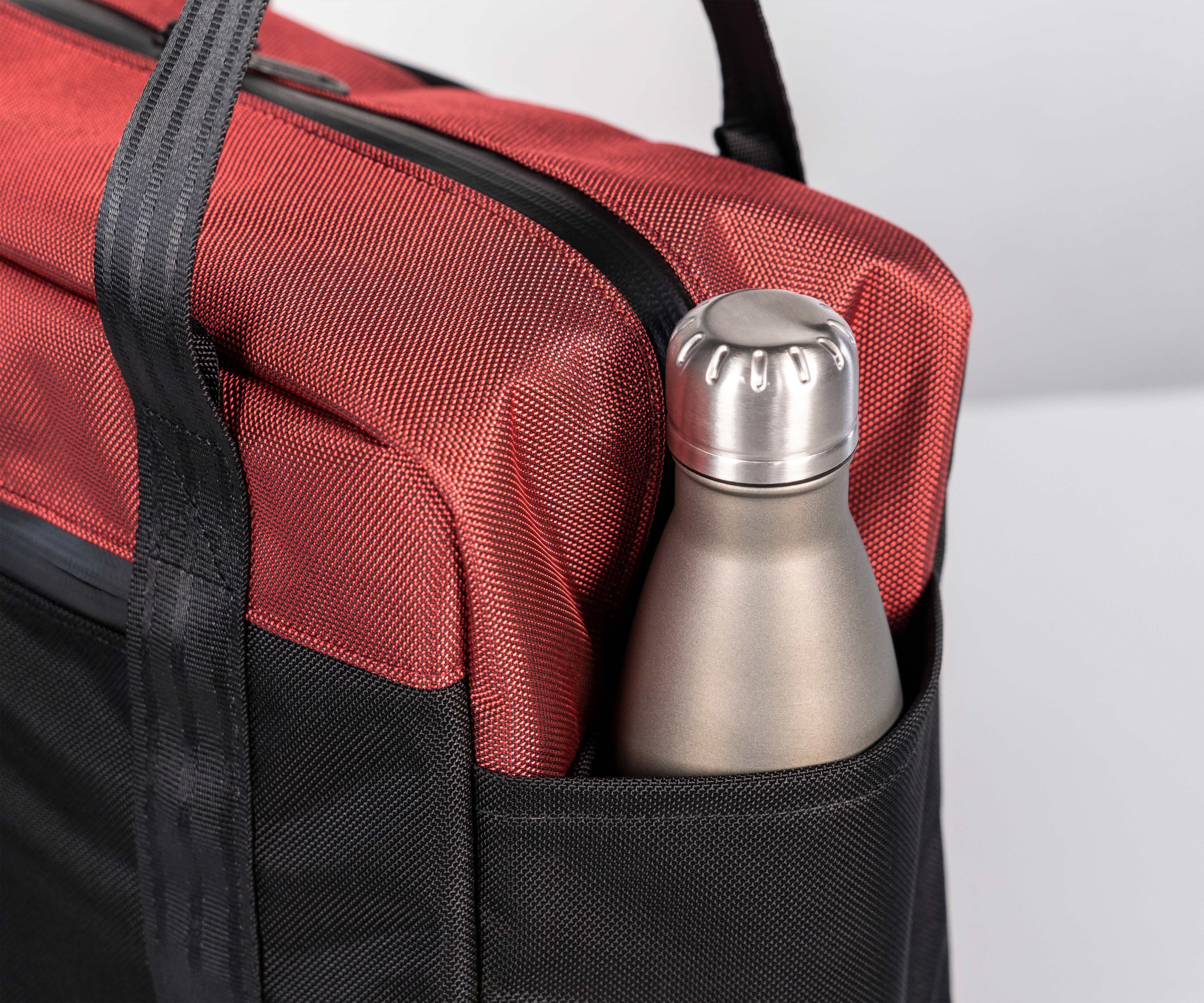 Side pockets for water bottles or catch-all