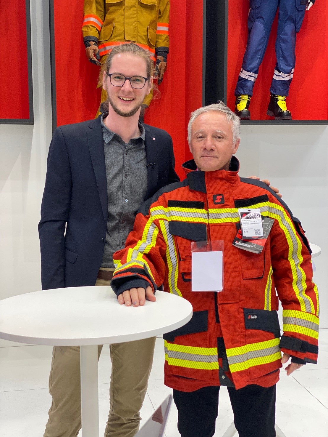 Jonas Kuschnir (left), head of product development for S-GARD, poses with Eric Gouget (right), Growth Leader Emergency Response, DuPont