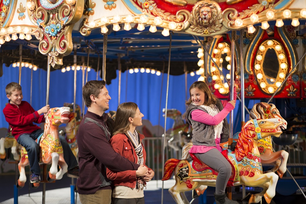 An antique Christmas carousel is the perfect photo opp!