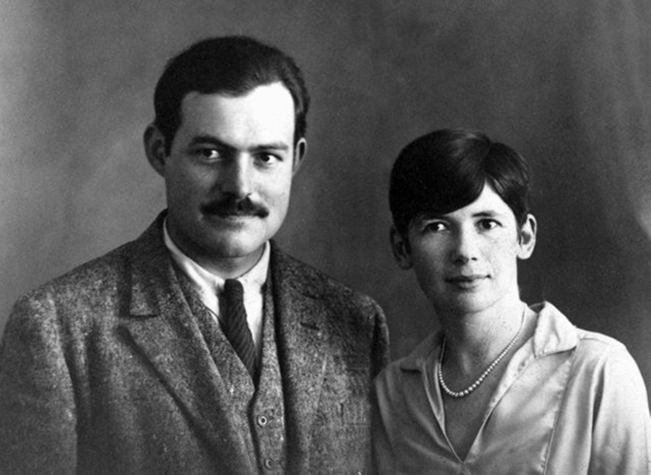The marriage of Ernest and Pauline Hemingway, shown on their wedding day in Paris in 1927, offers an emotional and suspenseful story arc for Darla Worden’s Hemingway biography “Cockeyed Happy.”