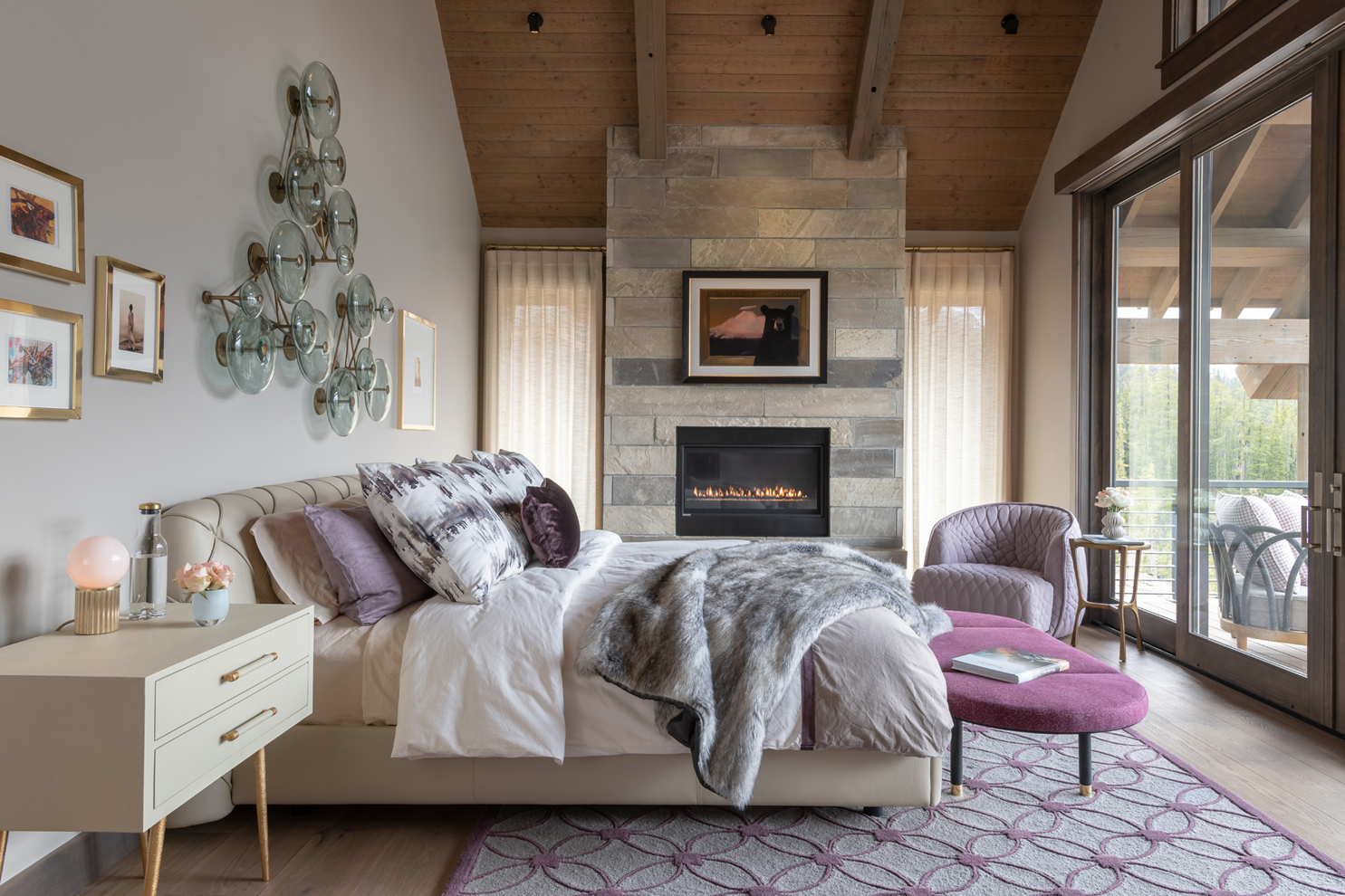 The favorite color of an Envi Interior Design Studio client informs this luxe primary bedroom in the Yellowstone Club that is focused on the mountain views (PC: Audrey Hall).