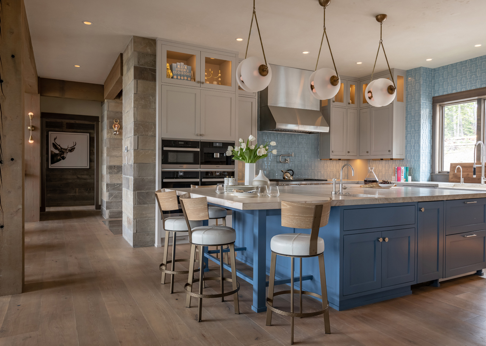 This “Blue Bird Powder Day” Montana home by Envi Interior Design incorporates bold color from local skies and regional materials presented in a sophisticated alpine style (PC: Audrey Hall).
