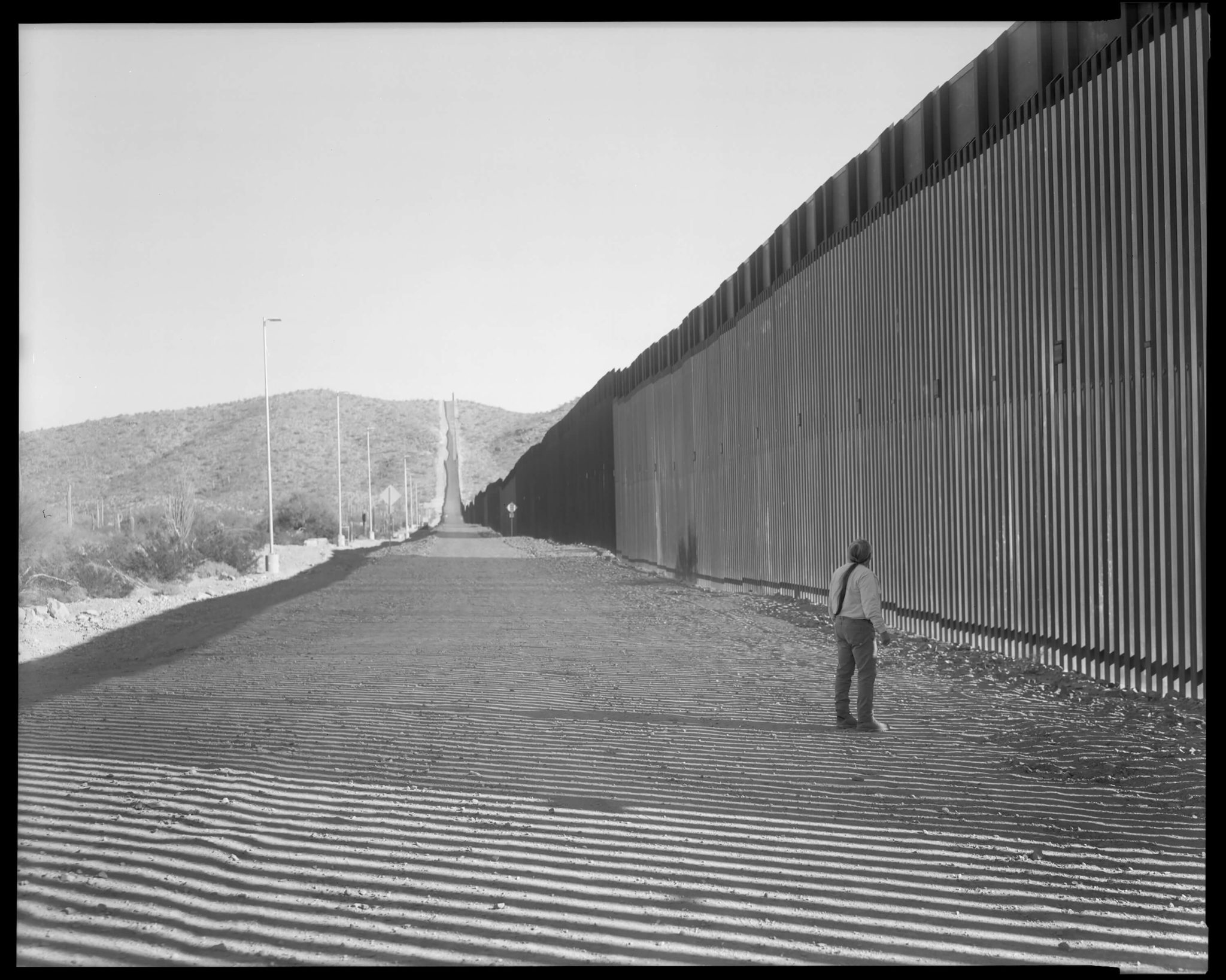 Samuel in Front of Monument Hill, where his ancestors are buried, Arizona, 2021 - Lisa Elmaleh