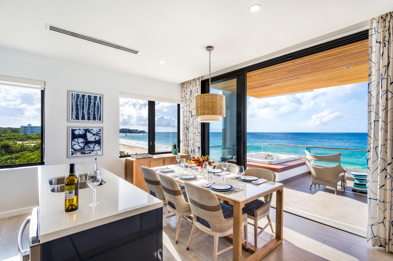 Modern vacation retreats wrap guests in beachy-chic comfort with full kitchens, spa-like baths, outdoor hot tubs and ensuite laundry.