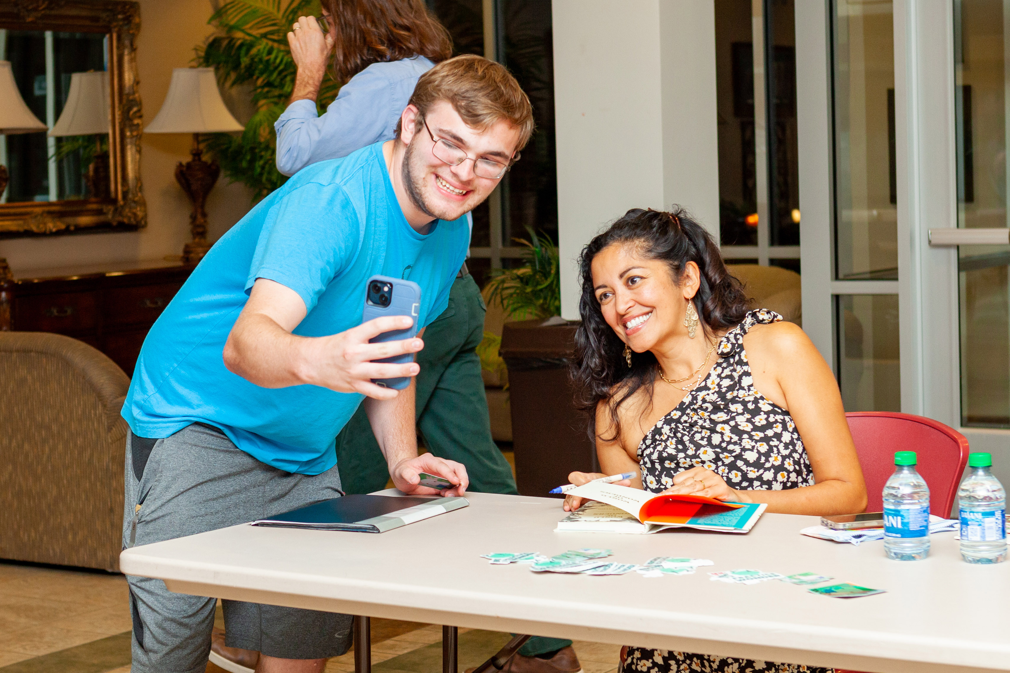 FHU freshman Ben Cooper took a selfie with Nezhukumatathil after she signed a copy of “World of Wonders” for him.