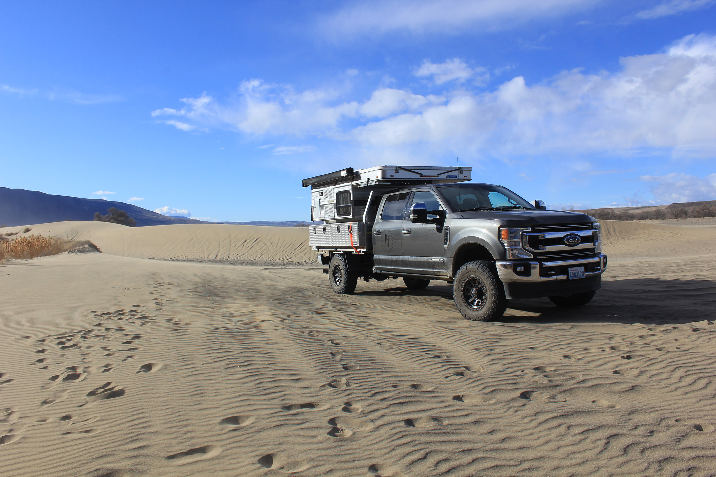 Next Jump Outfitters new overland flatbed build going the distance in at Beverly Dunes
