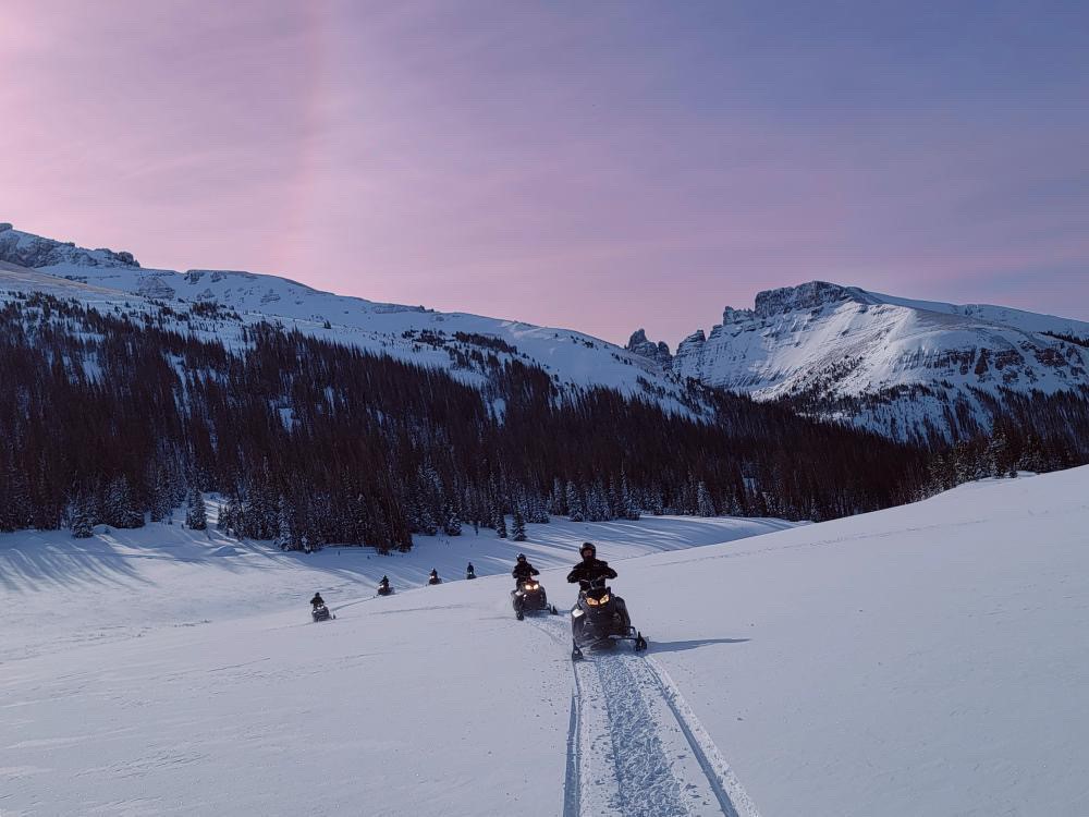 Though snowmobiling is the most popular winter activity, Brooks Lake Lodge guests can explore a variety of outdoor snowy fun with snowshoeing, XC skiing and ice fishing.