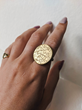 Large SMO Gold Signet Ring, by Rebus, in 18K Gold, worn on a model.