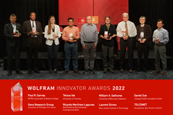 Stephen Wolfram stands with 8 Innovator Award winners accepting their awards