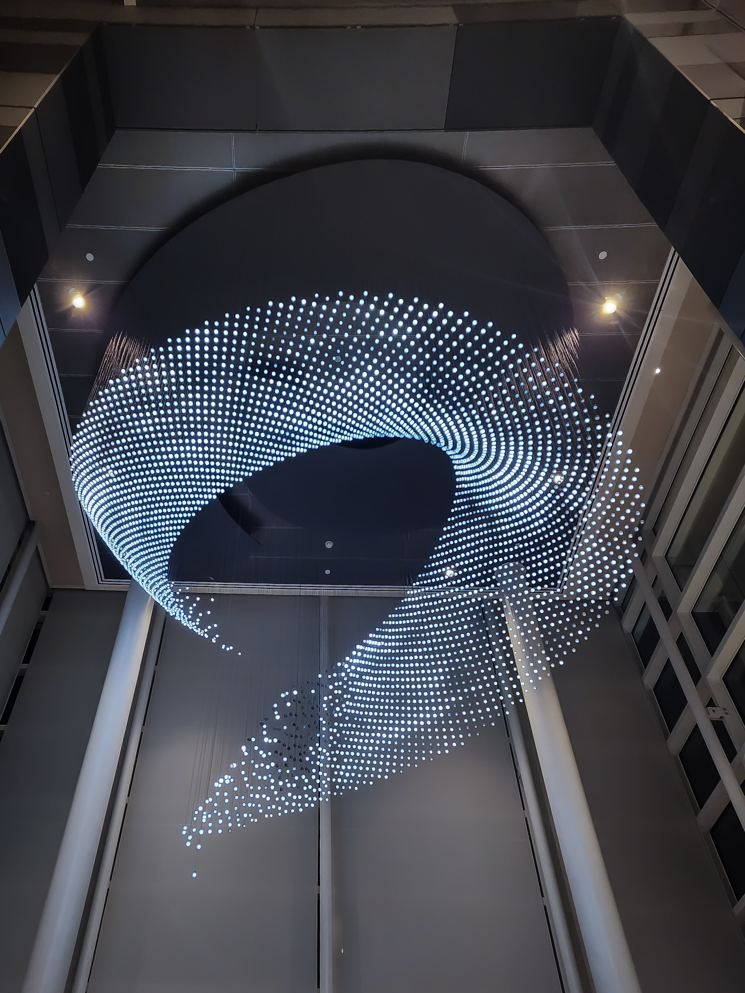 Helical Trace by Jim Campbell (2022), LUMA Hotel, corner of Third and Channel streets. Photo by Aaron Danzig.