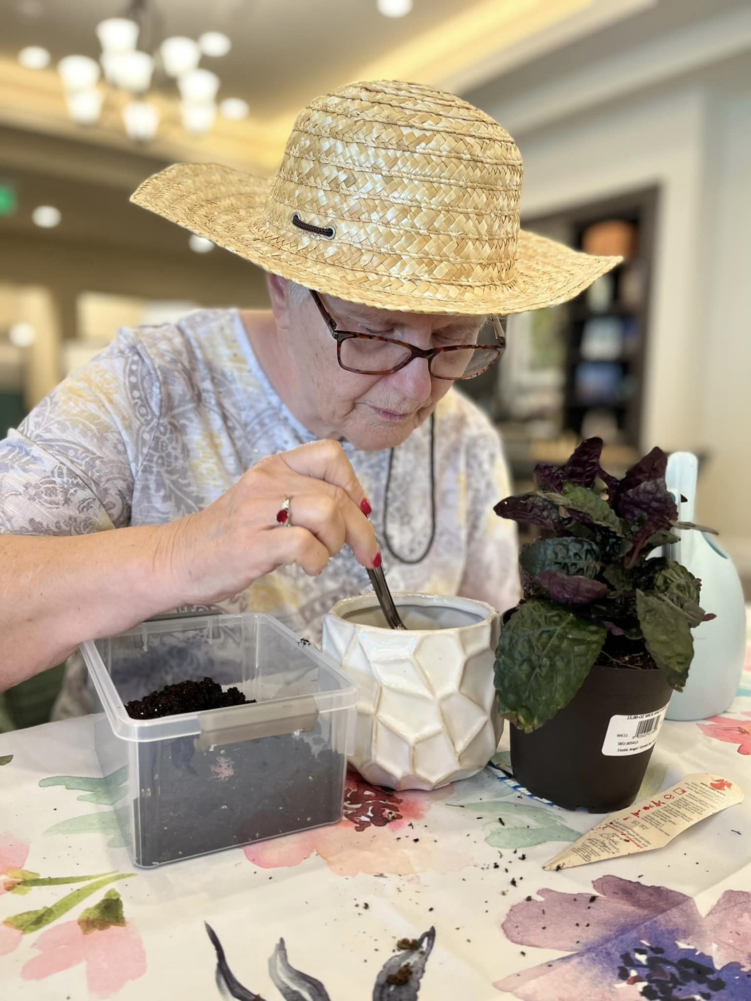Silverado resident planting flowers during activities