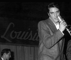Image used as a source by Kelly Telfer: Elvis at his last Louisiana Hayride Day performance (Jack Barham, 1956) Courtesy: Rockabilly Hall of Fame Museum