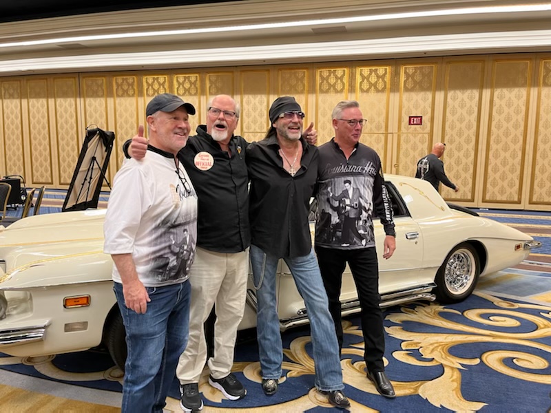 (left to right) Joey Kent, Kelly Telfer, Danny Koker, and Jeff Cole pose in front of the 1974 Stutz Blackhawk reportedly once owned by Elvis
