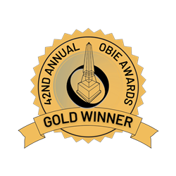 Award seal with obelisk and banner 42nd Annual OBIE Awards Gold Winner