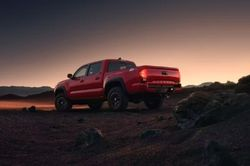 2023 Toyota Tacoma TRD Off-Road parked in a rocky terrain