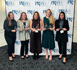 Five Violet PR team members posing with PRSA-NJ awards.
