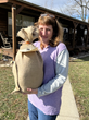 Laura Shellhorse, neighbor to the Meridian Waste Eagle Ridge Landfill in Bowling Green, Mo., poses with her gifted turkey.