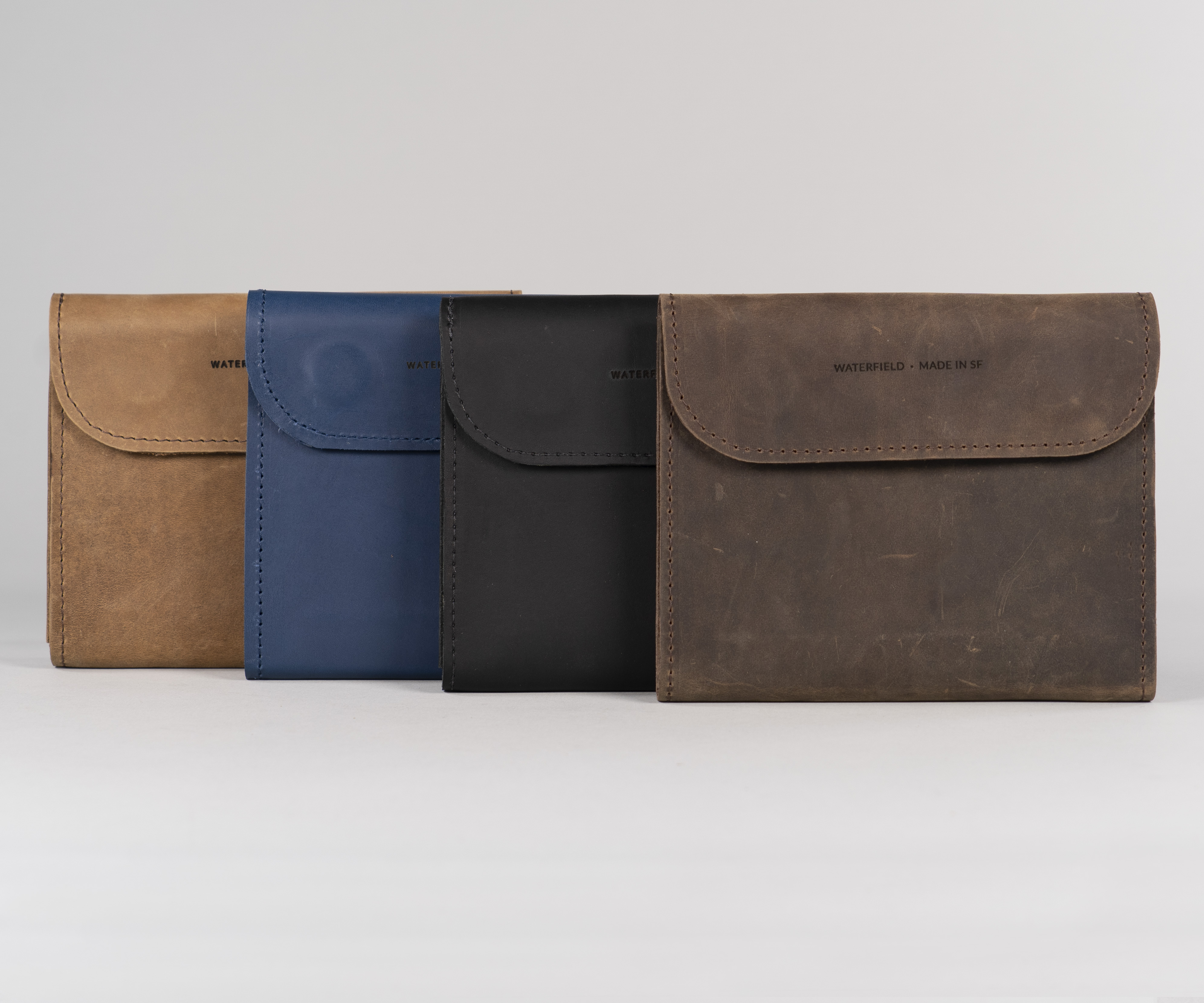 Grizzly, blue, black, and chocolate full-grain leather
