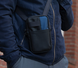 Essential iPhone Crossbody Pouch - with blue accent. Ideal carry for the Apple iPhone or other similar smartphones from Samsung, Google, and more brands.