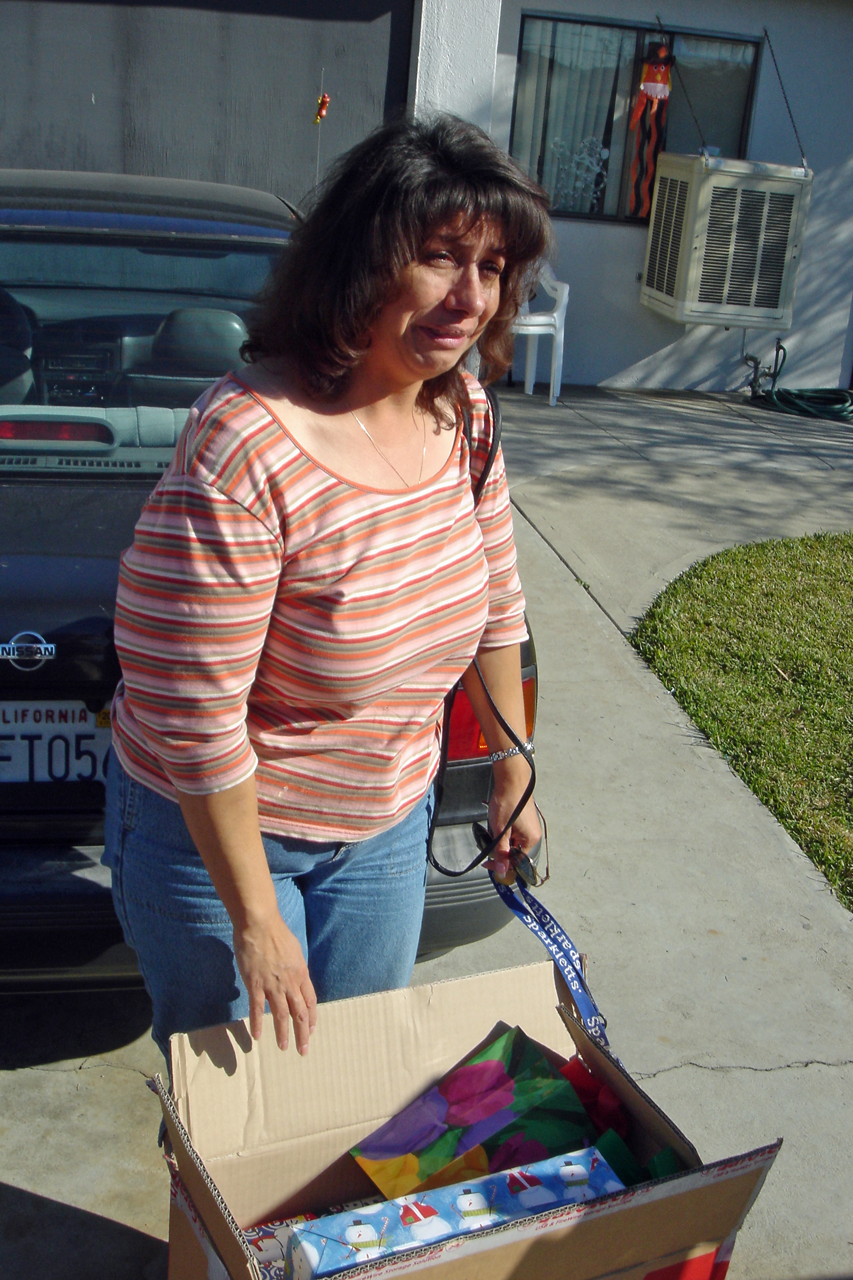 This single mom cried in her driveway when gifts arrived unexpectedly on Christmas eve, 2005. Children's home addresses were left on letters until 2008, and volunteers could deliver gifts in person.