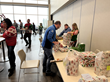 AprilAire employees wrap gifts for at need kids in preparation for Santa's Workshop on Dec. 15.