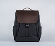 Miles Laptop Backpack: black ballistic nylon with chocolate leather flap. Fits a 16-inch MacBook Pro or similar PC and 12.9-inch iPad or similar tablet