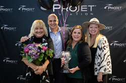 ProJet Aviation GM Julie O'Brien, CEO Shye Gilad, and Executive Administrator Courtney DesMarais receive FBO of Member of the Year Award from Paragon Aviation Group President & Cofounder Megan Barnes