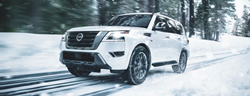 A 2023 Nissan Armada on a snow-covered road