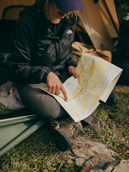 Woman in Tent with Map