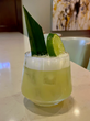 A cocktail garnished with a lime and leaf at the Capital Hilton's Statler Lounge.