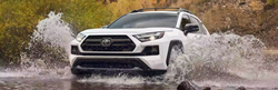 2023 Toyota RAV4 White splashing through water