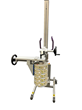 Stainless roll handling equipment with single arm clamping vertical spindle attachment.
