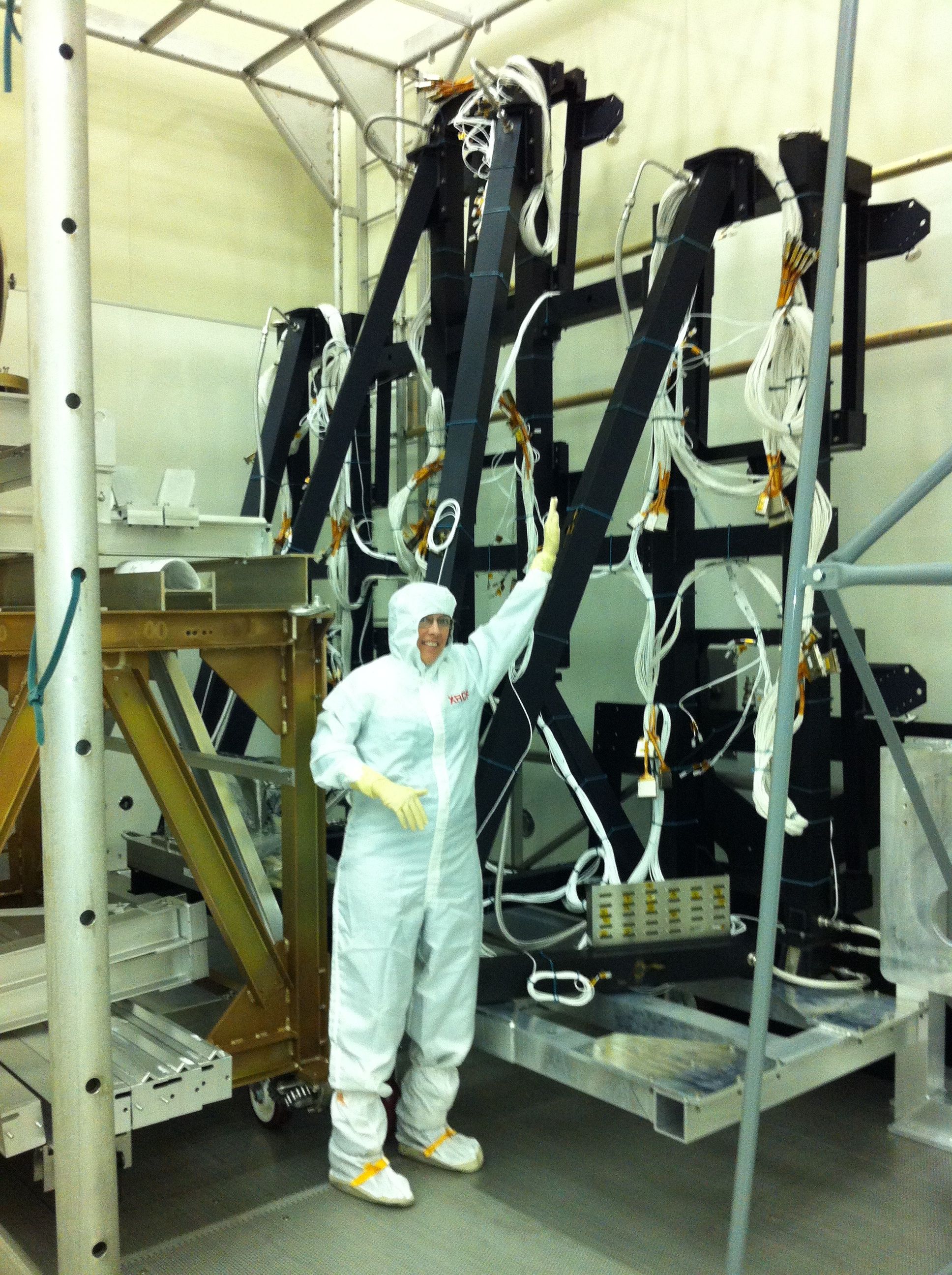 Dr. Hammel with James Web Space Telescope hardware.
