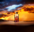 Gladiator Oud perfume in front of dramatic sky