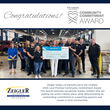 Zeigler Subaru of Kenosha team present charity the Sharing Center with a $25,885 donation