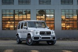 2023 Mercedes-Benz G-Class AMG® G 63 SUV parked outside a building