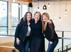 Karen Bowery (center) will turn leadership of Ankrom Moisan Interiors over to Alissa Brandt (left) and Leah Wheary Brown (right)  