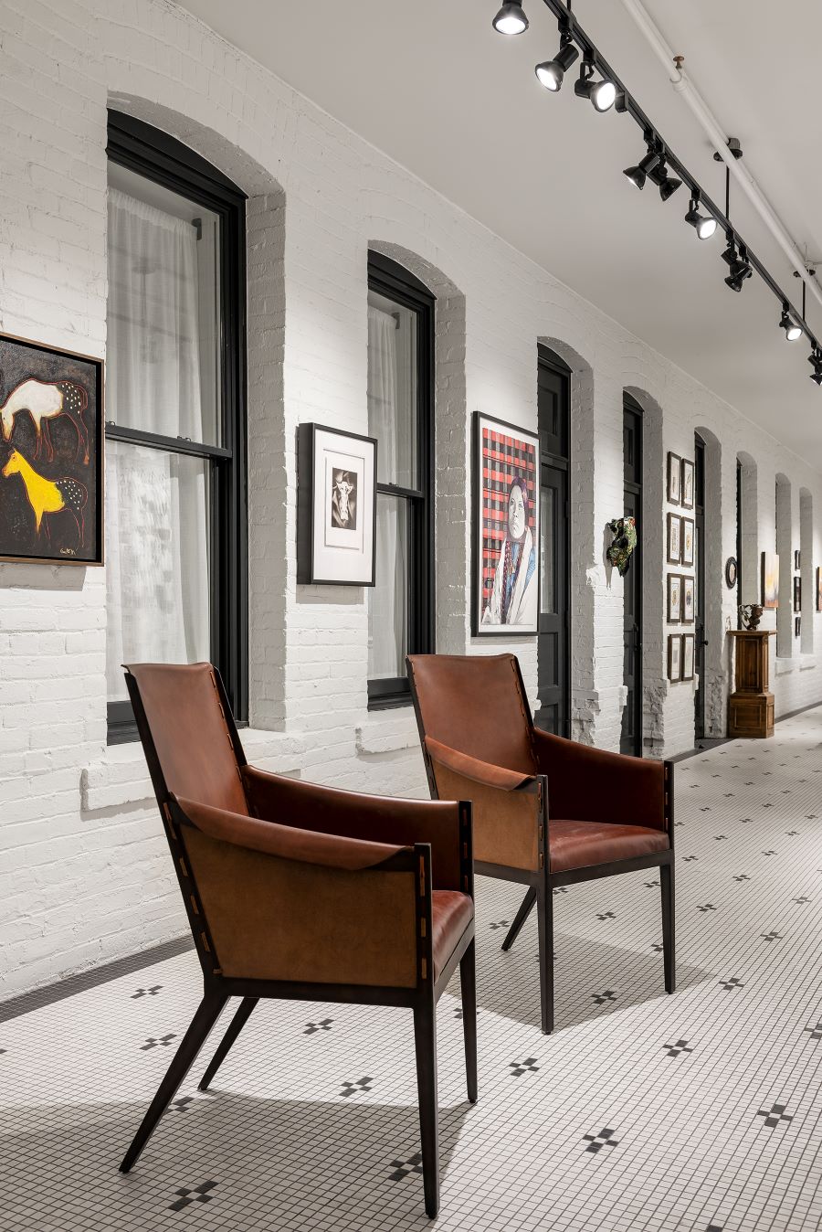 Shown here in Kibler & Kirch’s Stapleton Gallery, where Young curates work from talented Montana artists, the Gunnison Chair combines variegated natural leather with contemporary lines.